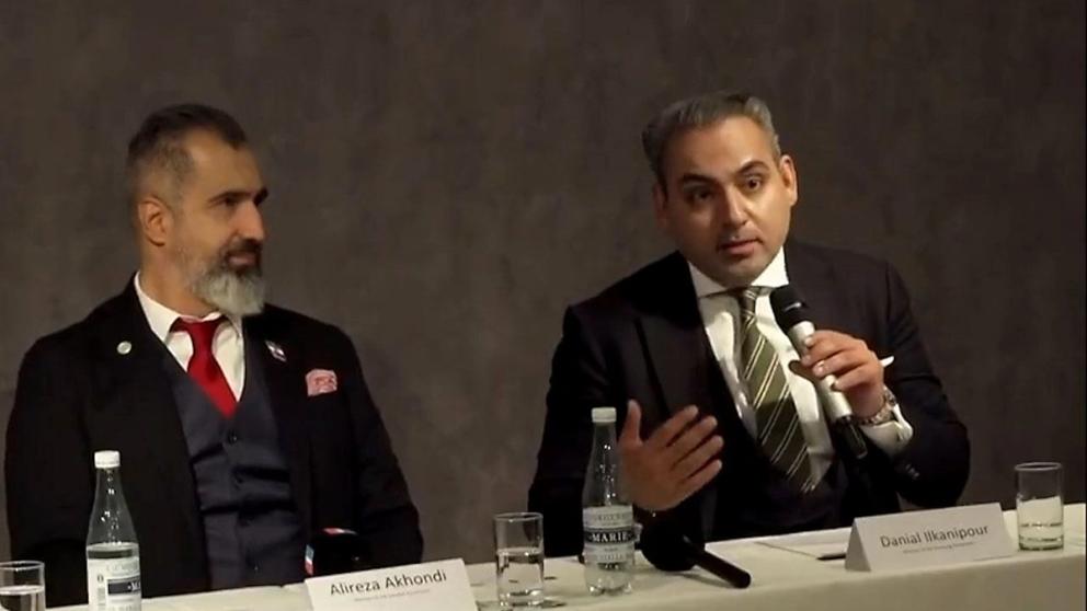 Member of the Swedish parliament Alireza Akhondi (left) and member of the Hamburg city parliament Danial Ilkhanipour at an event on February 19, the eve a rally outside the European Parliament in the Belgian capital Brussels 