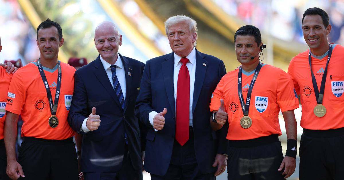 Thumbs up: Iranian football referee's pose alongside Trump stokes ire