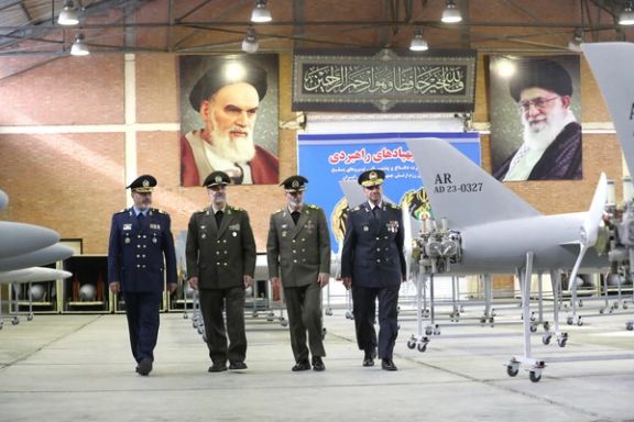 Iran's Army chief Major General Abdolrahim Mousavi and Defense Minister Brigadier General Mohammad-Reza Ashtiani visit a drone site at an undisclosed location in Iran, in this handout image obtained on April 20, 2023.