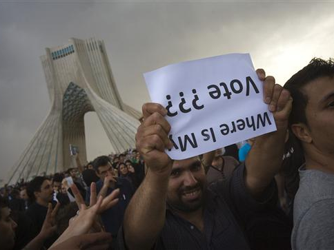 A protester holds a "Where Is My Vote" placard during post-electon protests in Tehran in 2009