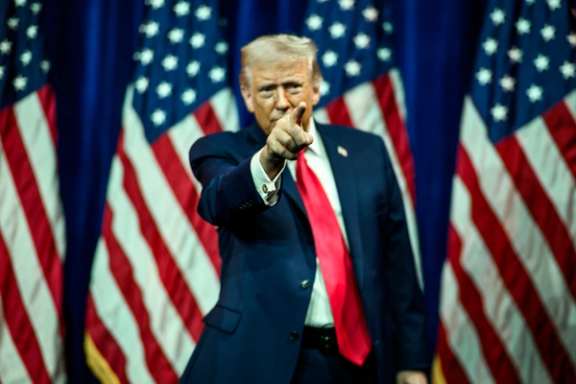 President Donald Trump gestures to the crowd after delivering remarks at the House GOP Member Retreat, Tuesday, January 6, 2026, at the Donald J. Trump - John F. Kennedy Center for the Performing Arts in Washington, DC (Official White House Photo by Daniel Torok)