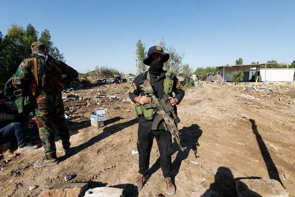 Iran-Linked Iraqi Group Suspends Attacks On US Targets