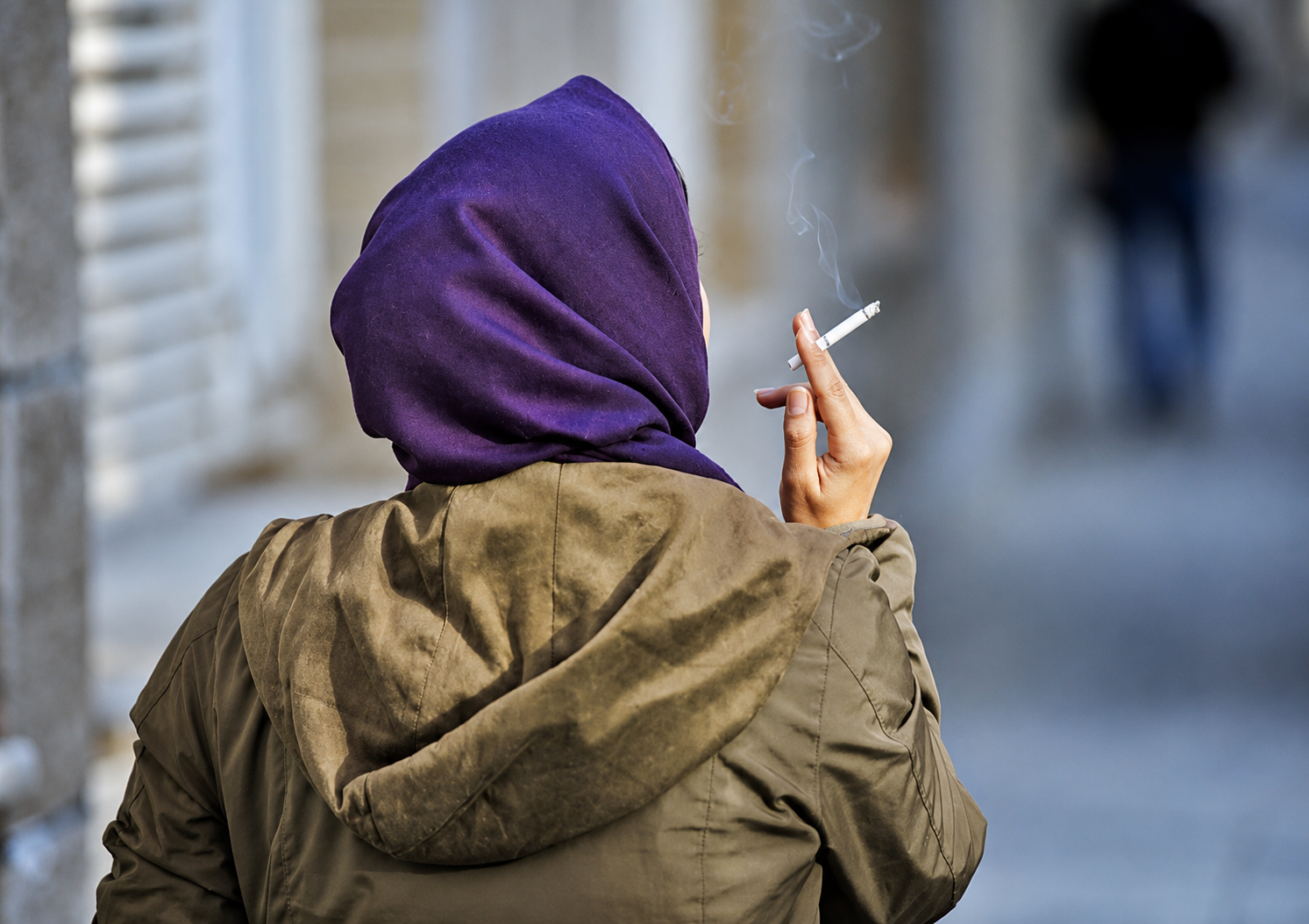 An Iranian woman smokes in this undated file photo.