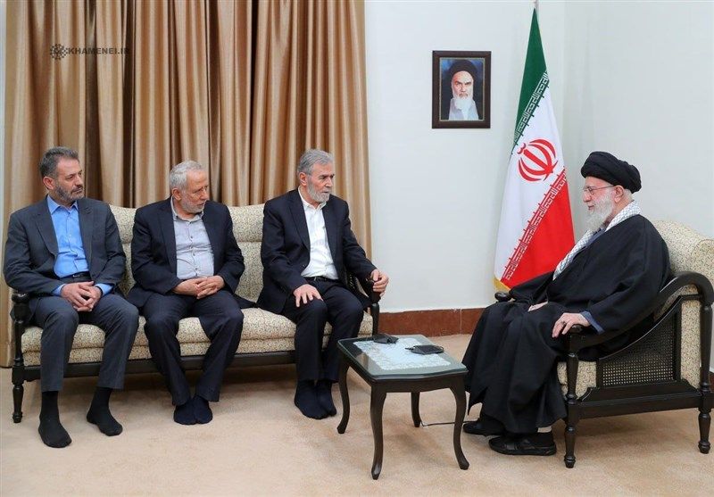 Ziyad al-Nakhalah, the Secretary-General of the Islamic Jihad Movement (3rd left) and Iran’s ruler Ali Khamenei (right) during a meeting in Tehran on March 28, 2024
