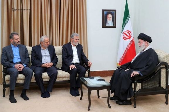 Ziyad al-Nakhalah, the Secretary-General of the Islamic Jihad Movement (3rd left) and Iran’s ruler Ali Khamenei (right) during a meeting in Tehran on March 28, 2024