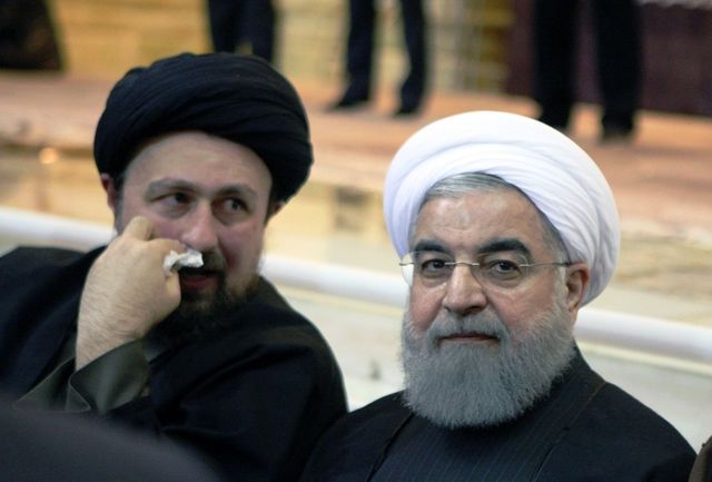 Former president Hassan Rouhani (white turban) and Hassan Khomeini, a grandson of Iran's first supreme leader