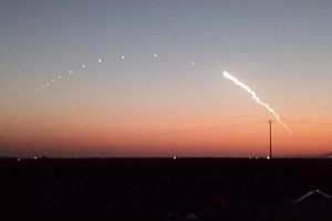 Rare missile tests streak through Tehran twilight