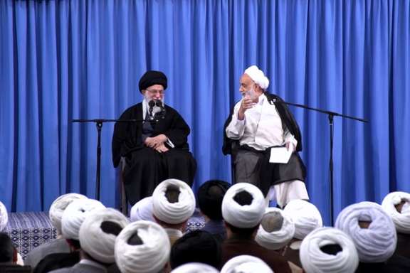 Iran’s Supreme Leader Ali Khamenei (left) and cleric Mohsen Qara’ati