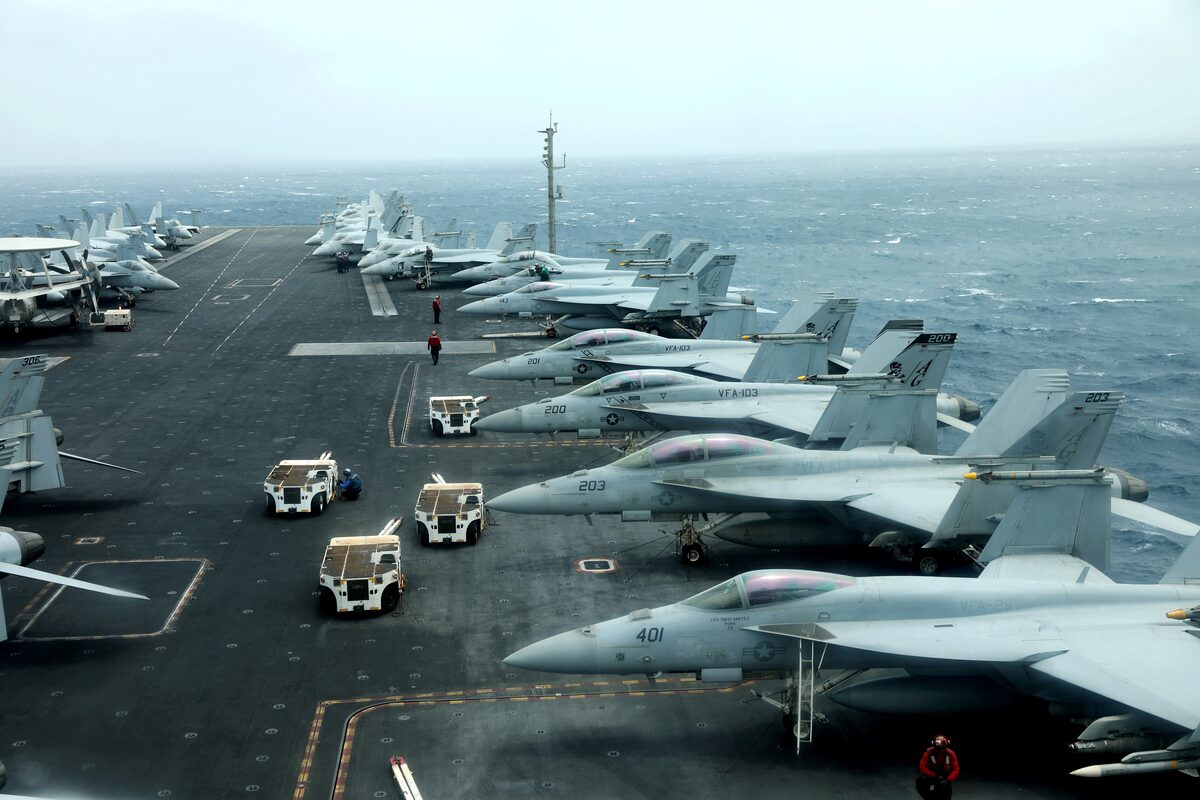 Iranian official rhetoric girds for war as US fleet nears