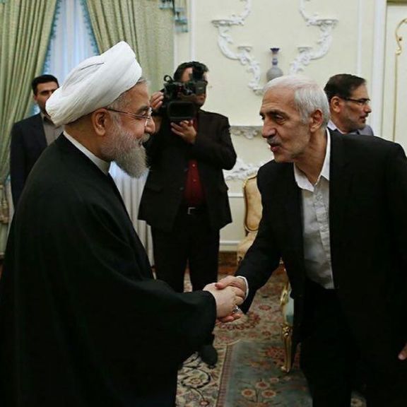 Former President of Iran’s Football Federation Mohammad Dadkan and former president Hassan Rouhani