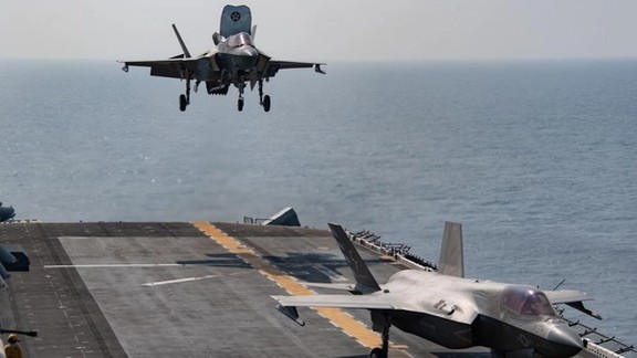 A US Navy plane landing on an aircraft carrier. FILE PPHOTO