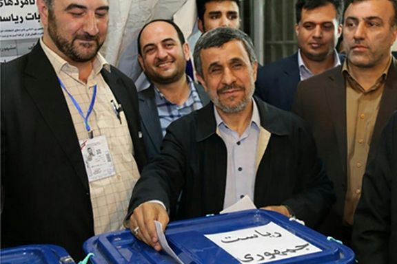 Iran’s former president Mahmoud Ahmadinejad casting his vote in a presidential election