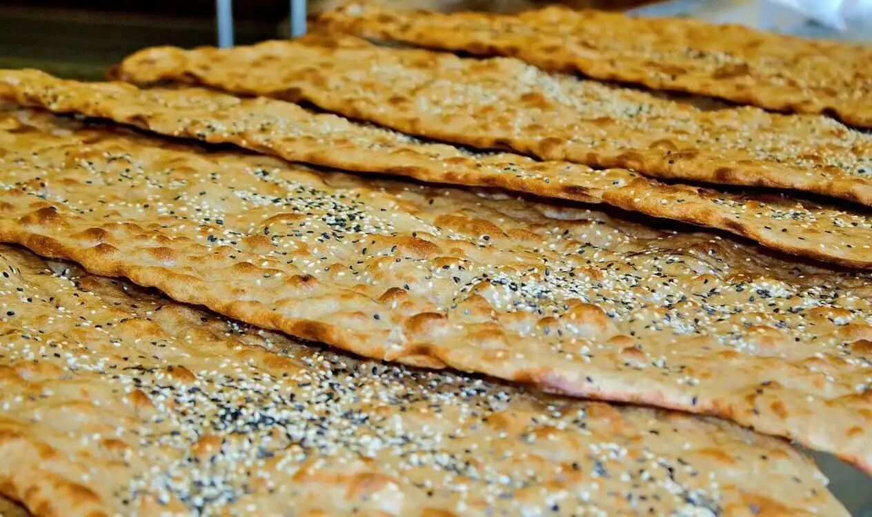 Freshly baked Sangak bread is displayed at a bakery in Iran