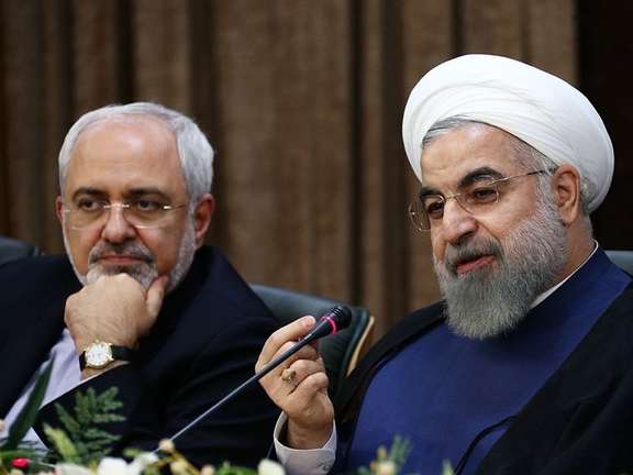 Former Iranian president Hassan Rouhani and his foreign minister Javad Zarif. Undated