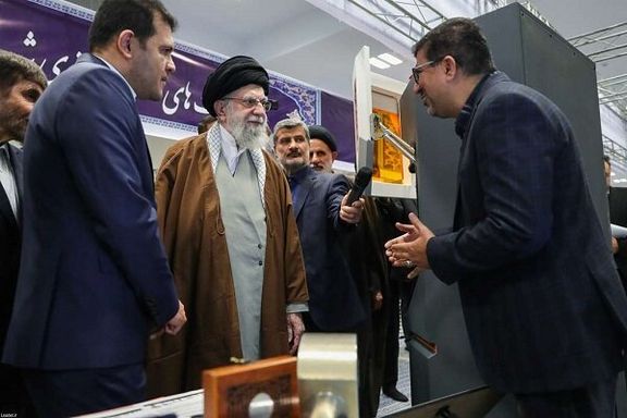 Hossein Assadi (right) unveils a demo of the AI platform during a visit of Iran's Supreme Leader Ali Khamenei and Vice-President Hossein Afshin (left) to an exhibition in January 2025.
