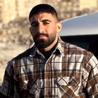 پیکر امید سرلک پس از به آتش کشیدن تصویر خامنهای در الیگودرز پیدا شد