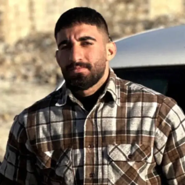 پیکر امید سرلک پس از به آتش کشیدن تصویر خامنهای در الیگودرز پیدا شد