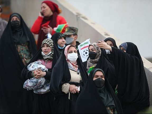 Female spectators watching the Iran-Iraq soccer match in Tehran. January 27, 2022