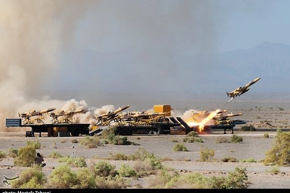 An Iranian drone flies during a military exercise in an undisclosed location in Iran.