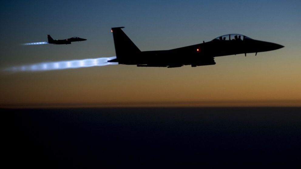 US warplanes fly in a dusk training exercise