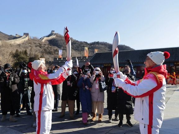 حمل مشعل المپیک زمستانی توسط جکی چان