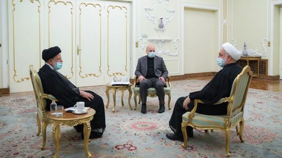 Iran’s President Ebrahim Raisi (left), Parliament Speaker Mohammad-Bagher Ghalibaf (center), and Chief Justice Gholam-Hossein Mohseni-Ejei during a meeting