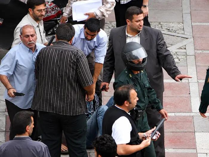 Iranian security and plainclothes forces confronting protestors during the 2009 Iranian election protests following the disputed presidential election.