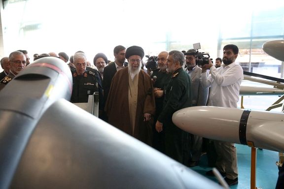 Iran's Supreme Leader Ali Khamenei looks at an Iranian drone during his visit to the IRGC Aerospace Force achievements exhibition in Tehran, Iran November 19, 2023.