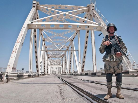 An Afghan border guard at the crossing point with Uzbekistan. Undated