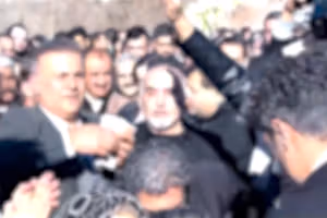 Iranians burying slain protest youths mourn with dancing and defiance