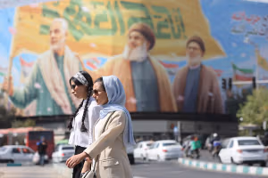 Conservatives clash over hijab law as Tehran streets move on