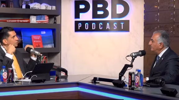 Patrick Bet-David (left) hosting Iran’s exiled prince Reza Pahlavi in his PBD Podcast (November 2023)
