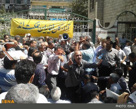 Veterans of the Iran-Iraq war demonstrate outside the Foundation of Martyrs and Veterans Affairs in Tehran.