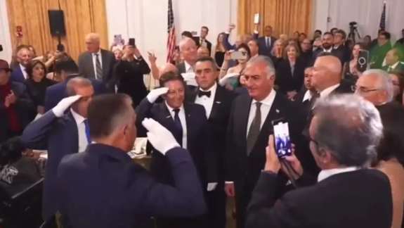 Former members of the Imperial Iranian Air Force salute Iran's exiled Prince Reza Pahlavi, May 31, 2024.