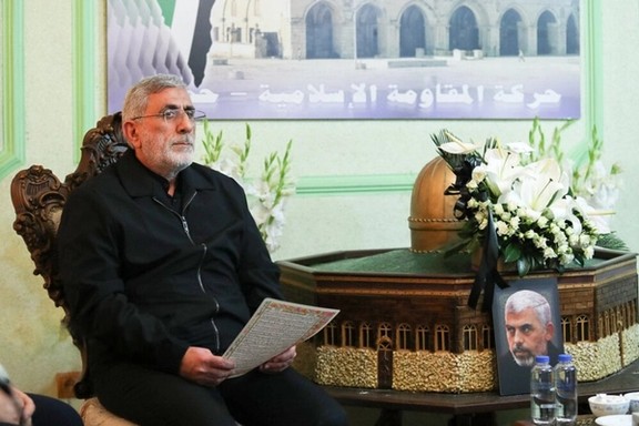 The commander of the Revolutionary Guards' Quds Force, Ismael Qa'ani, pays tribute to slain Hamas commander Yahya Sinwar at the Palestinian group's office in Tehran, Iran, October 2024