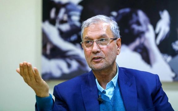 Former government spokesman Ali Rabiei )عدیشفثی(