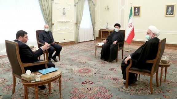 President Riaisi, the speaker of parliament, the head of the judiciary and Mokhber (L) in a meeting on January 1, 2023