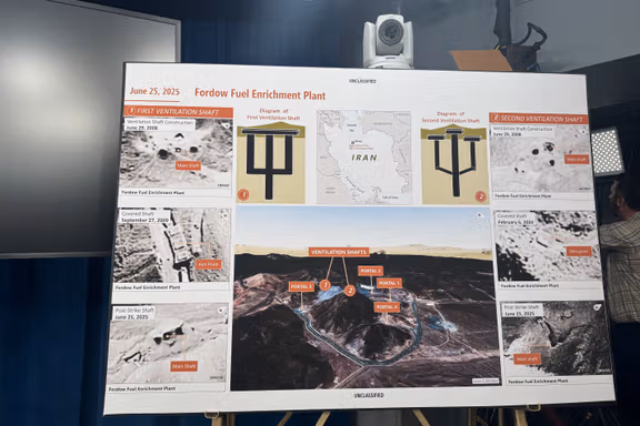 A poster is displayed of Iran's Fordow Fuel Enrichment Plant during a press briefing with US Defense Secretary Pete Hegseth and Chairman of the Joint Chiefs of Staff, Air Force General Dan Caine (both not pictured) at the Pentagon in Arlington, Virginia, June 26, 2025.