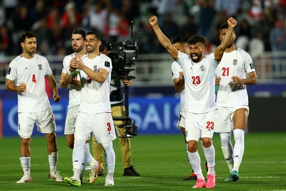 Iran's Ramin Rezaeian celebrates with teammates after a match against Syria at the AFC Asian Cup Round of 16 in Doha, Qatar, January 31, 2024