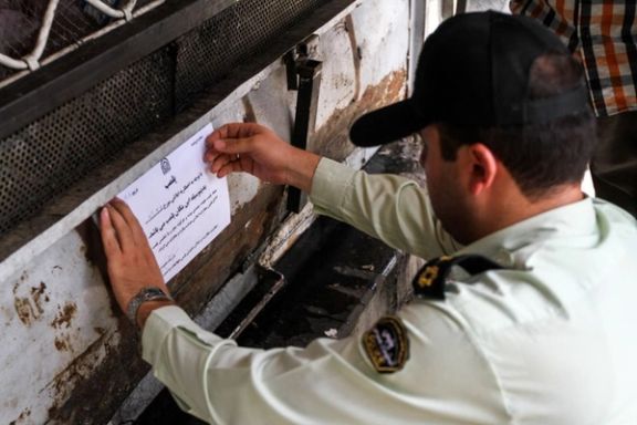 A shop being sealed for failing to comply to Ramadan regulations