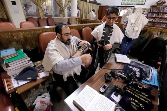 Iranian Jews preparing for prayers at the Abrishami synagogue at Tehran’s Palestine street