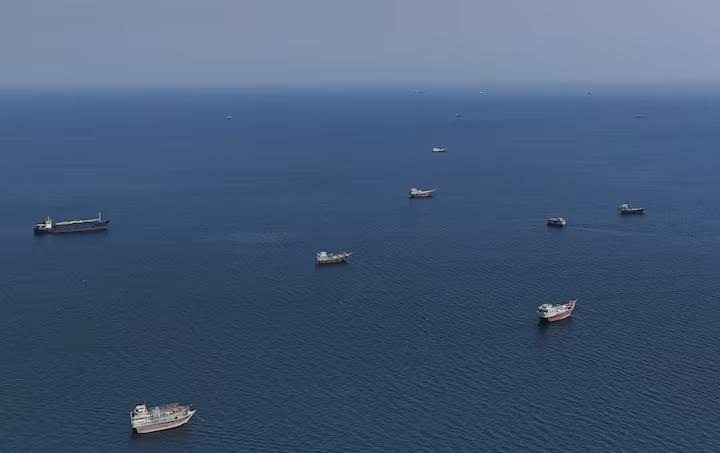 A drone view shows vessels near the Strait of Hormuz, as seen from Musandam, Oman, October 2, 2026. REUTERS/St