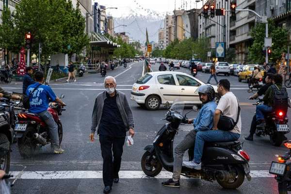 Iranians say wages vanish under rent, food and medical costs