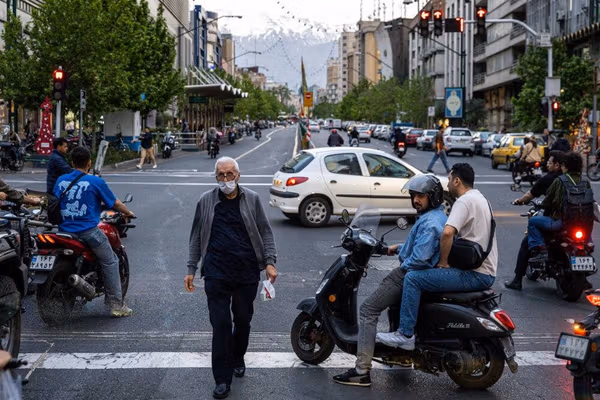 Iranians say wages vanish under rent, food and medical costs