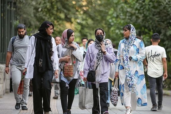 Young women strolling in central Tehran, Iran