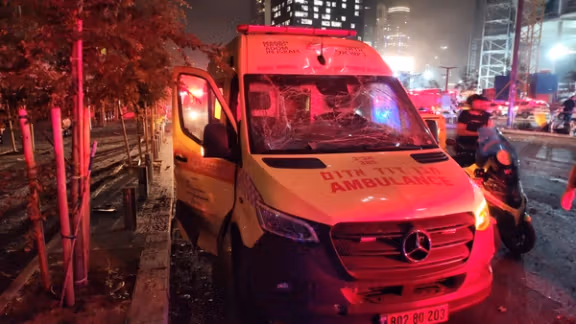 An Israeli ambulance from the Magen David Adom paramedic group is shown damaged amid Iranian missile attacks, June 14 2025.