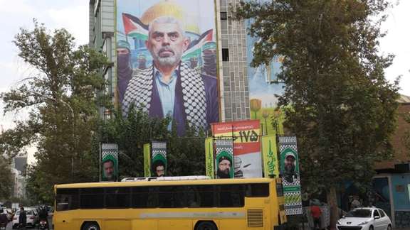 A billboard with a picture of the late Hamas leader Yahya Sinwar is displayed on a building in Tehran, Iran, October 19, 2024
