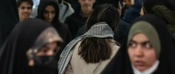 An Iranian woman with loose hijab in Tehran