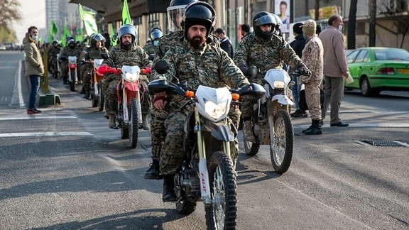 Members of Iran's domestic paramilitary force the Basij rally on motorcycles