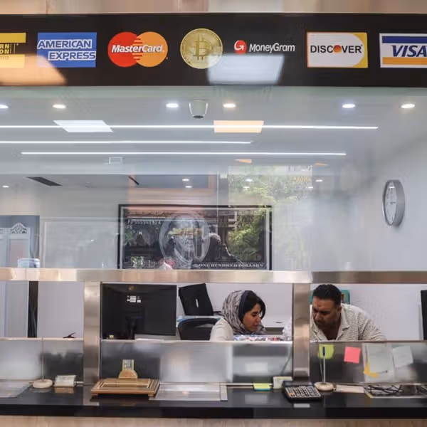 Iran currency slide sets fresh records as dollar passes 1.28m rials